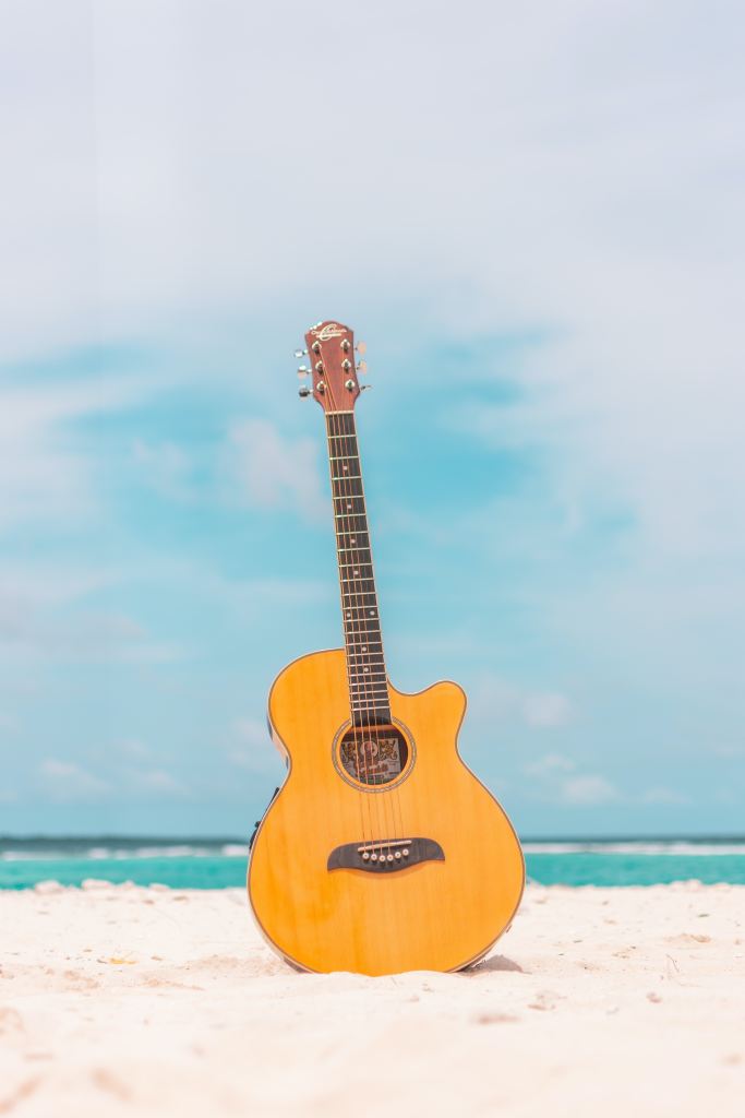 guitar-on-beach-sand