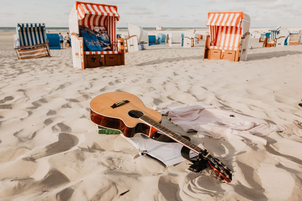 guitar-at-beach-on-sand