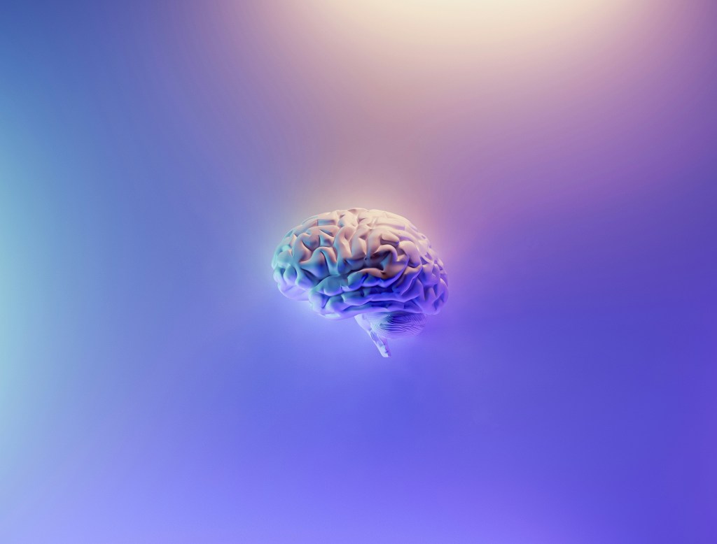 brain-in-center-of-purple-background